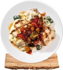 Seasons 52 signature dishes Wood-Grilled Wild Alaska HalibutLump Crab CakeLobster Bisque